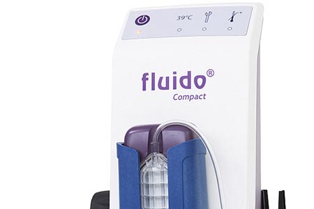 Compact blood and fluid warmer